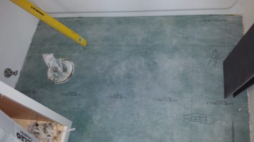 Bathroom floor with tile layout lines drawn