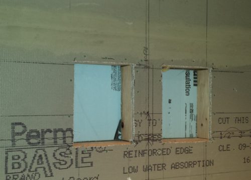 2 inch foam in back of recessed niche in an exterior wall of a shower