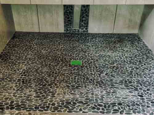 Pebble tile shower floor