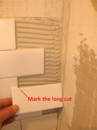 Mark cut ceramic subway tile