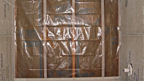 plastic vapor barrier behind cement board 