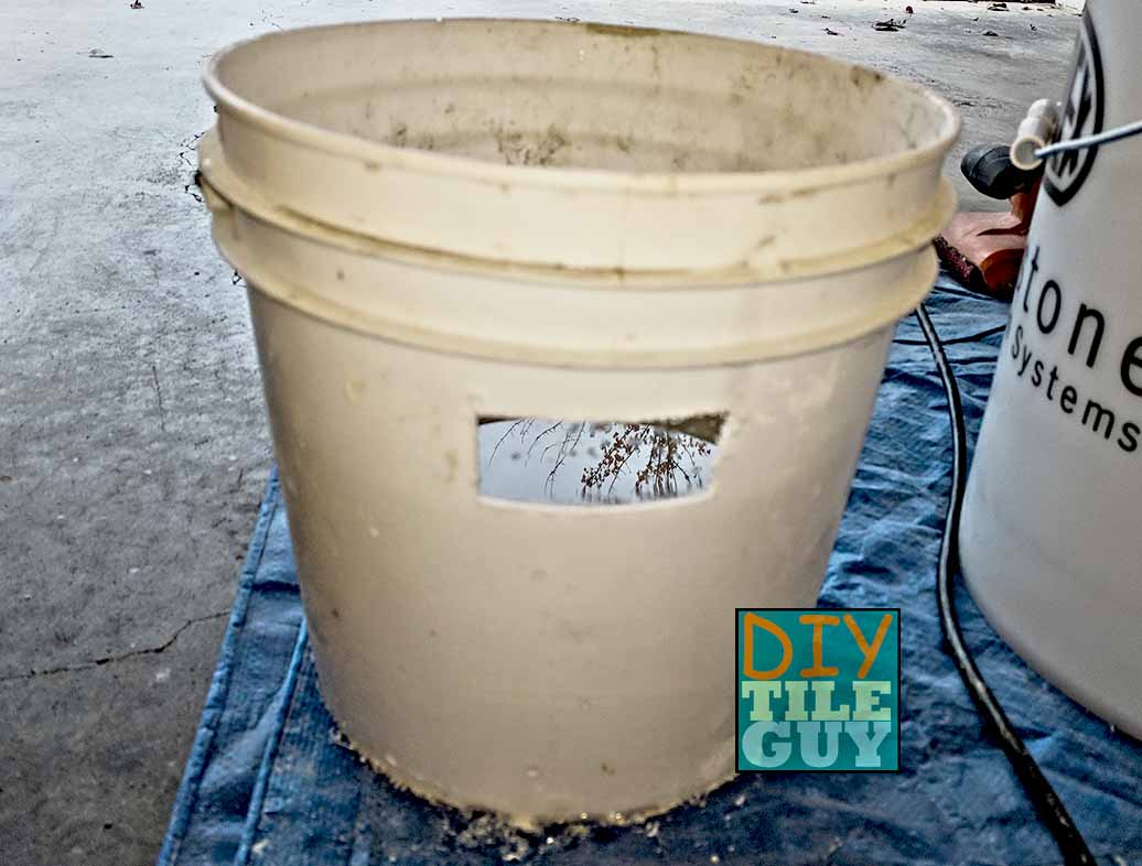 measuring bucket with cutout