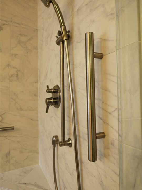 shower grab bars need careful consideration when installed in a barrier free shower