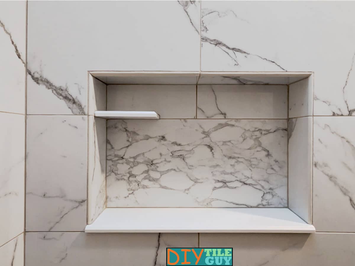 https://www.diytileguy.com/wp-content/uploads/2023/11/shower-niche-with-shelf.jpg