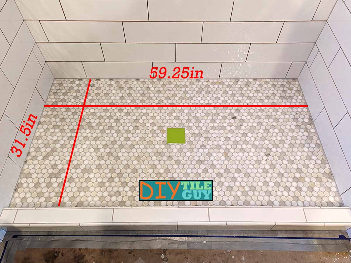 measuring the length and width of a shower floor to calculate square footage of mosaic tile