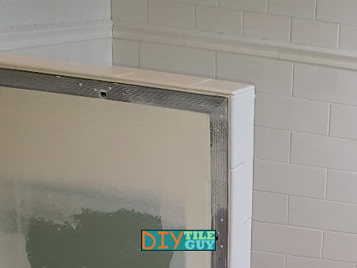 The metal drywall corner should be installed first when you are tiling only one side of the outside corner