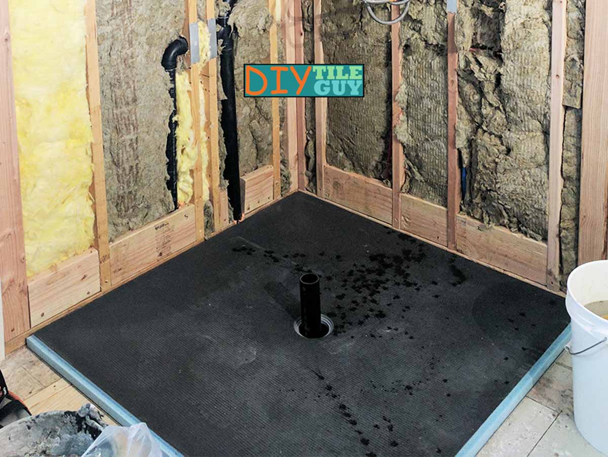 48 inch x 48 inch Wedi Fundo Primo shower pan being fitted into place prior to permanent installation